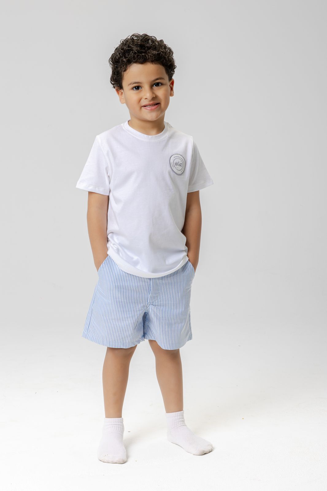 blue shorts boys + white top